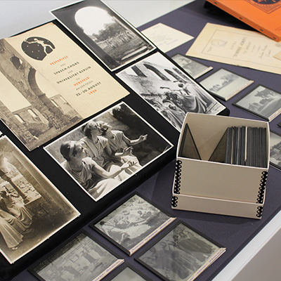 Selection of archival items: photographs, glass slides, programme notes, from the 1900s