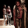 A production photograph of Antigone Power, 2018, by Sutta Scupa, depicting Glory Arekekhuegbe and Kassie Sunday as Antigone and Ismene