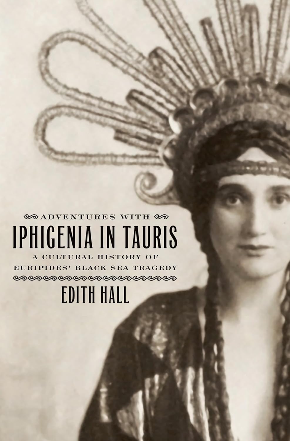 Cover of 'Adventures with Iphigenia in Tauris'. The title is written in black cover a sepia photo of Lillah McCarthy as Iphigenia in Granville-Barker’s US touring production (1915).