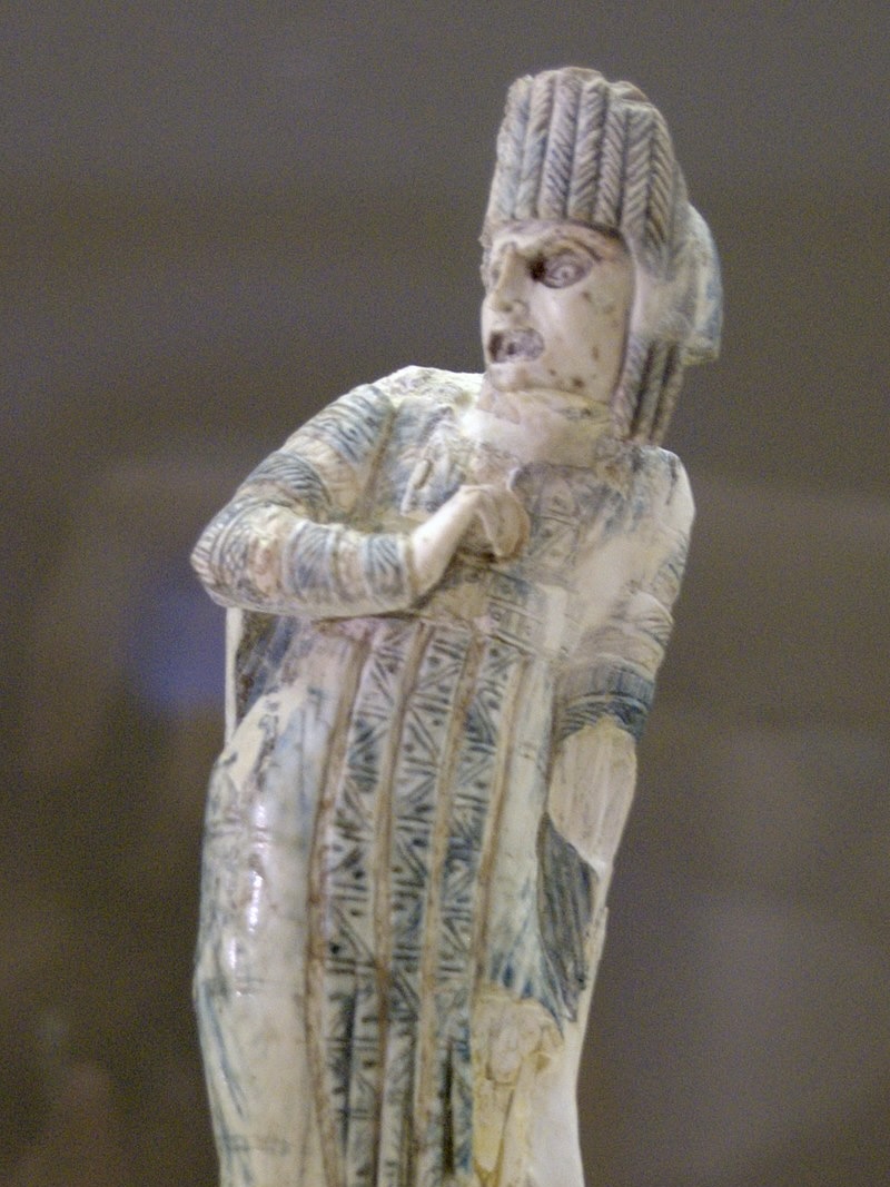 An ivory statuette of a Roman tragic actor.