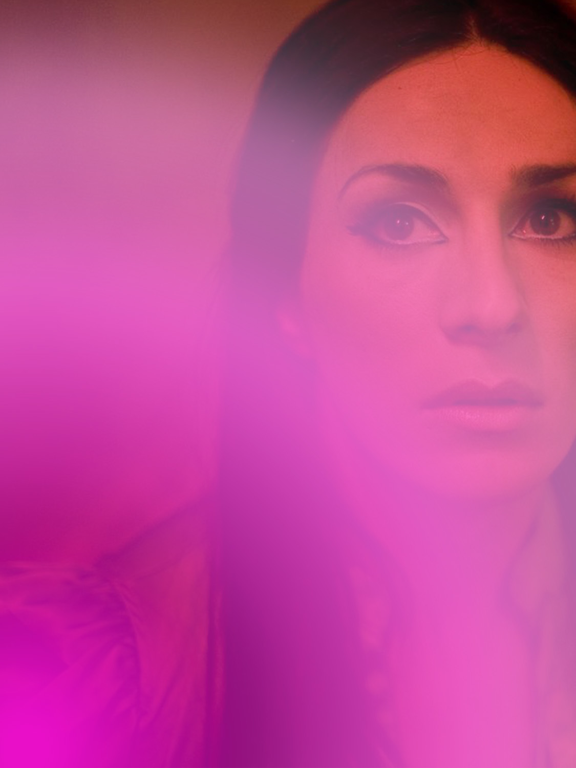 A screenshot from Panos H. Koutras's film, Strella, showing a portrait of a woman.